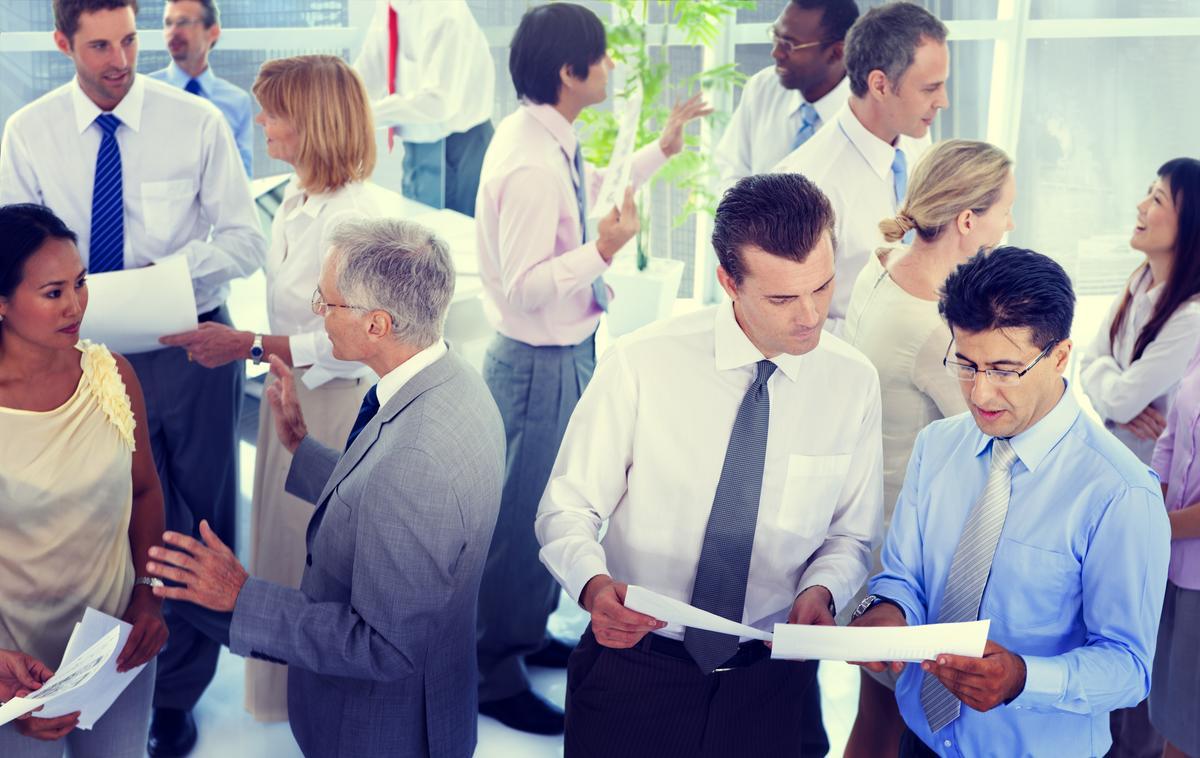 Many business people in an office