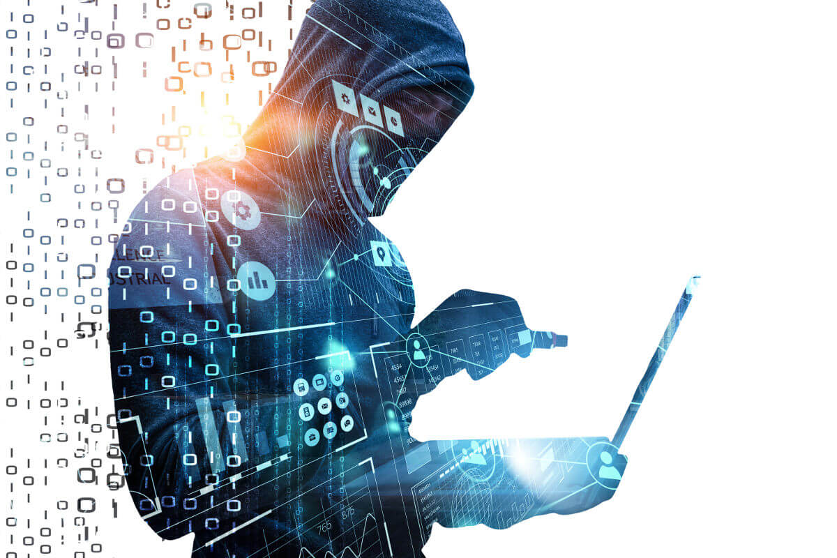 Hacker working on laptop