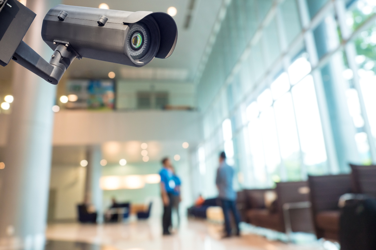 A surveillance camera monitoring a building interior